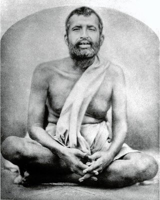 Sri Ramakrishna seated in front of Radhakanta temple, Dakshineswar, 1884
